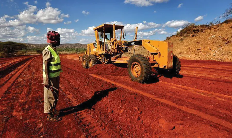 Motor grader working on road formation