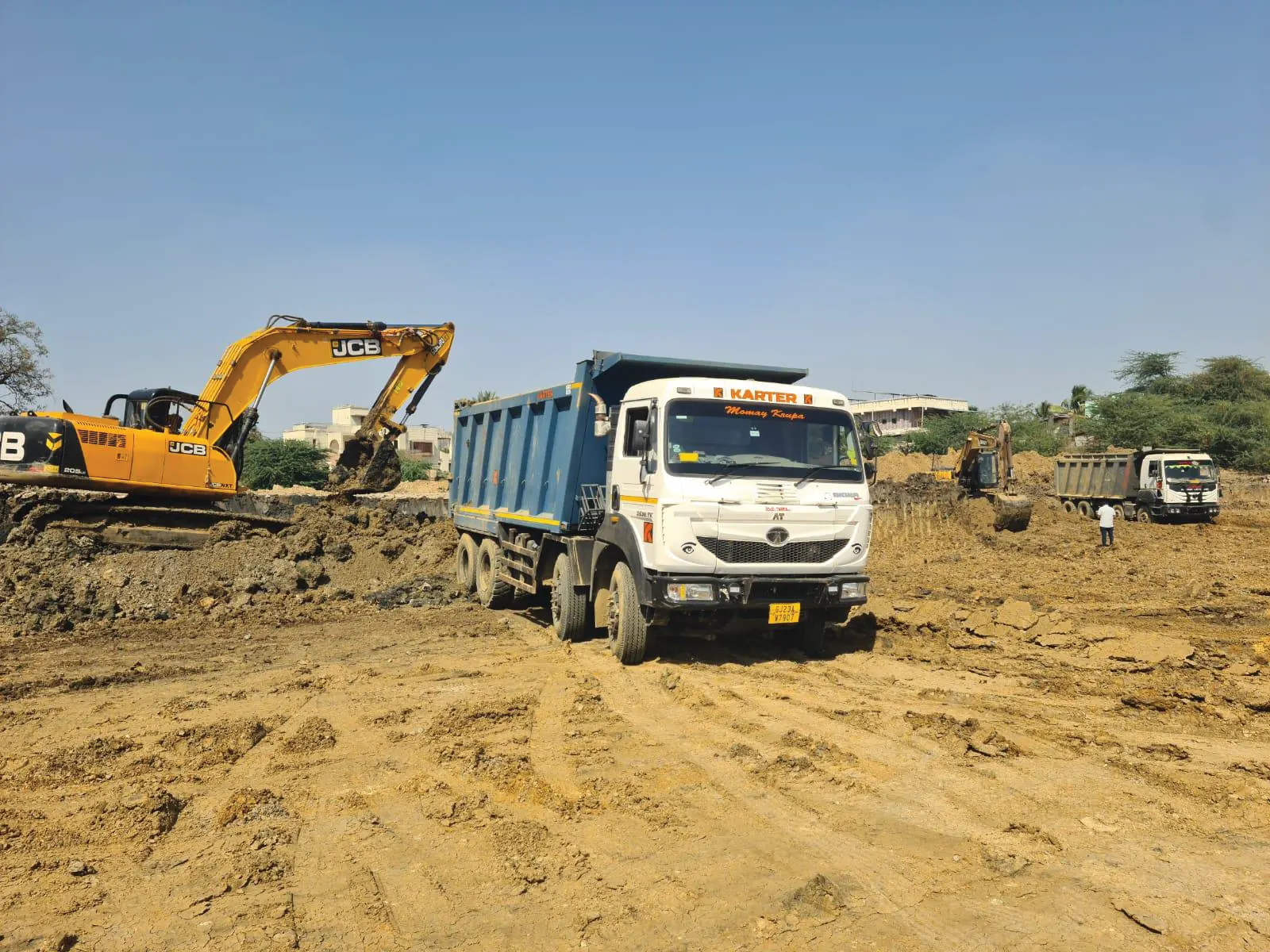 Karter tipper and excavator working on an earthwork site
